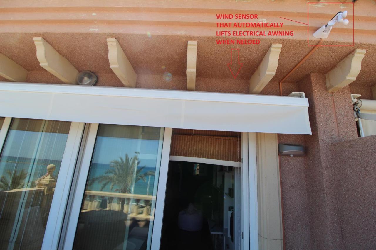 Appartamento Ático duplex de lujo frente al mar. 1a linea playa El Campello Esterno foto